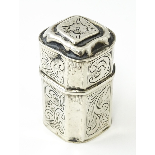 430 - A 19thC Dutch silver peppermint box with engraved decoration, c. 1868. Together with a miniature / c... 