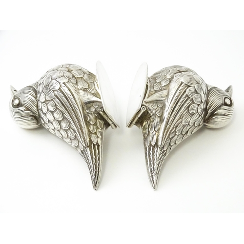 436 - A pair of novelty silver plate salts / peppers of bird form. Approx. 2