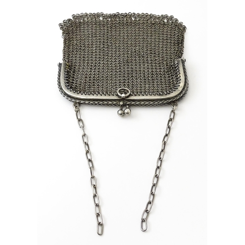 441 - A Continental sterling silver .935 chain purse. Approx. 3 3/4