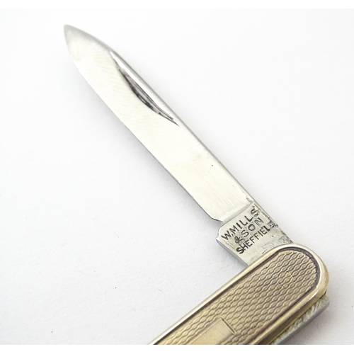 442 - A silver twin blade penknife with engine turned decoration hallmarked Sheffield 1966, maker W. Mills... 