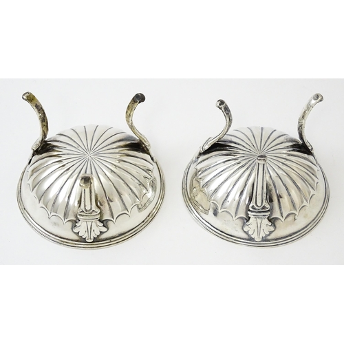 447 - A pair of unusual George III silver salts of circular form raised on three feet, hallmarked London 1... 