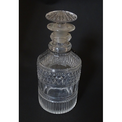 268 - A small 19thC three ring glass decanter with silver plate label. Approx. 7 1/2