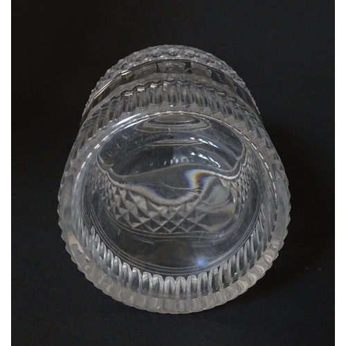 268 - A small 19thC three ring glass decanter with silver plate label. Approx. 7 1/2