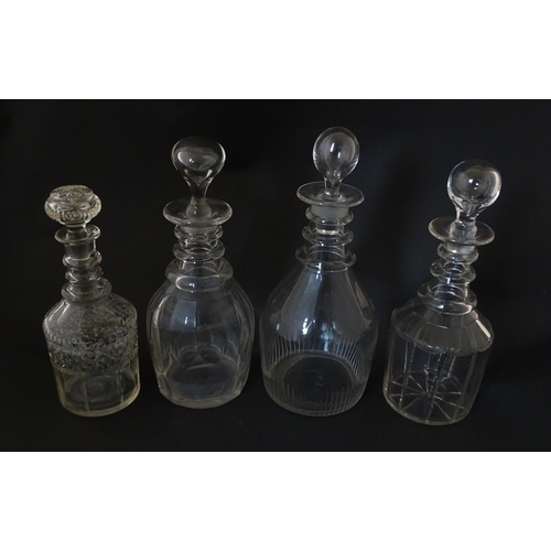 285 - Four assorted 19thC and later cut glass decanters. Largest approx. 11