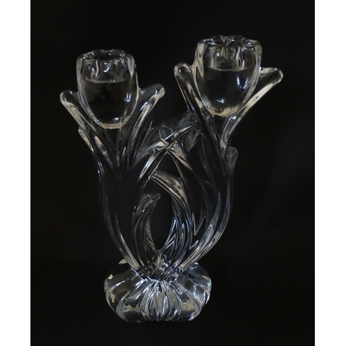 287 - A French glass double candlestick formed as stylised tulips. Bearing mark under for Cristal France. ... 