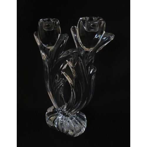 287 - A French glass double candlestick formed as stylised tulips. Bearing mark under for Cristal France. ... 