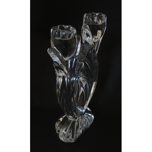 287 - A French glass double candlestick formed as stylised tulips. Bearing mark under for Cristal France. ... 