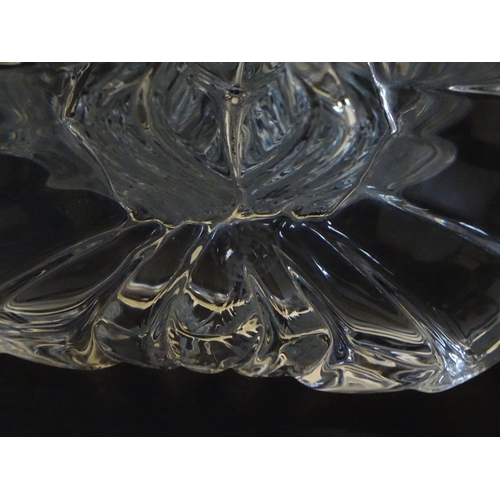 287 - A French glass double candlestick formed as stylised tulips. Bearing mark under for Cristal France. ... 