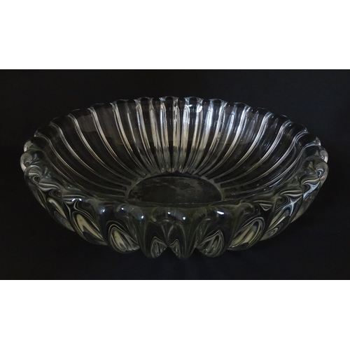 292 - A glass bowl of lobed form in the manner of Pierre d'Avesn. Approx. 11