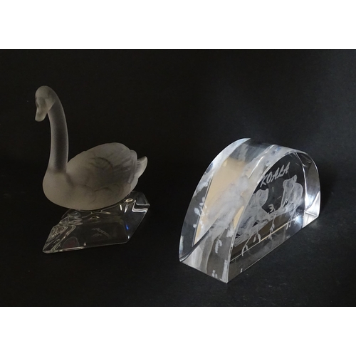 293 - Two Mats Jonasson paperweights one with polar bear detail, the other with cheetah. Together with a N... 