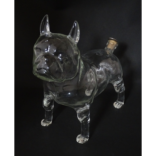 294 - A French novelty glass carafe / decanter modelled as a bulldog. Approx. 9 1/2