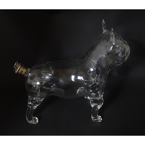 294 - A French novelty glass carafe / decanter modelled as a bulldog. Approx. 9 1/2