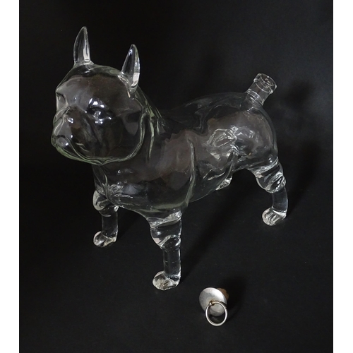 294 - A French novelty glass carafe / decanter modelled as a bulldog. Approx. 9 1/2