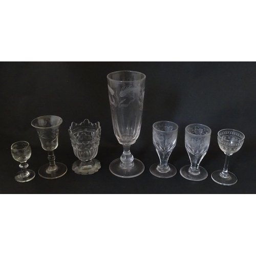 296 - A quantity of 19thC and later pedestal glasses one with etched barley decoration. Largest approx. 7 ... 