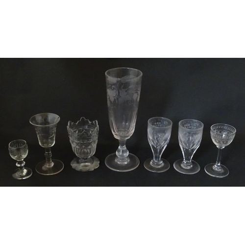 296 - A quantity of 19thC and later pedestal glasses one with etched barley decoration. Largest approx. 7 ... 