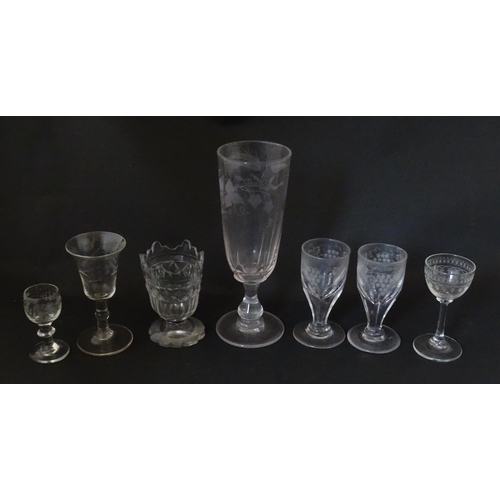 296 - A quantity of 19thC and later pedestal glasses one with etched barley decoration. Largest approx. 7 ... 