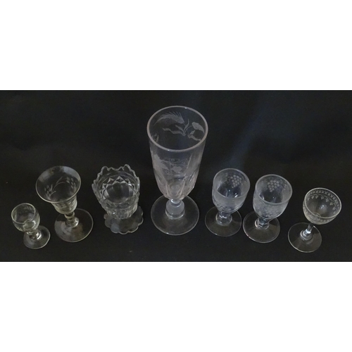 296 - A quantity of 19thC and later pedestal glasses one with etched barley decoration. Largest approx. 7 ... 