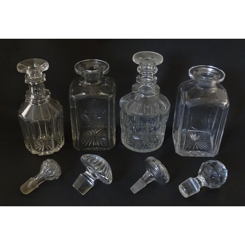 297 - A quantity of assorted Georgian and later decanters, flasks, carafe, etc. To include one with etched... 