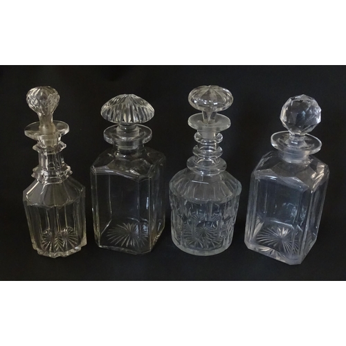 297 - A quantity of assorted Georgian and later decanters, flasks, carafe, etc. To include one with etched... 