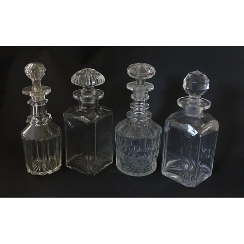 297 - A quantity of assorted Georgian and later decanters, flasks, carafe, etc. To include one with etched... 