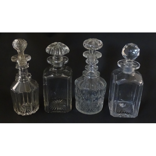 297 - A quantity of assorted Georgian and later decanters, flasks, carafe, etc. To include one with etched... 