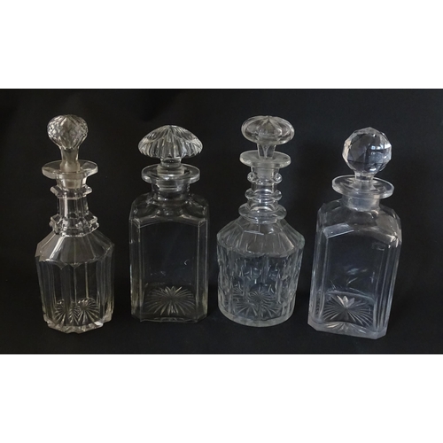 297 - A quantity of assorted Georgian and later decanters, flasks, carafe, etc. To include one with etched... 