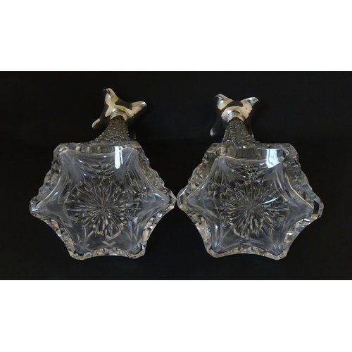 315 - A pair of cut crystal decanters hallmarked London 1911, maker Elkington & Co. Approx. 15 1/2