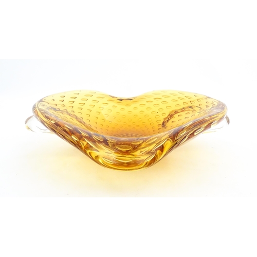 324 - Two Whitefriars controlled bubble ashtrays. Together with a Murano style amber glass bowl with contr... 