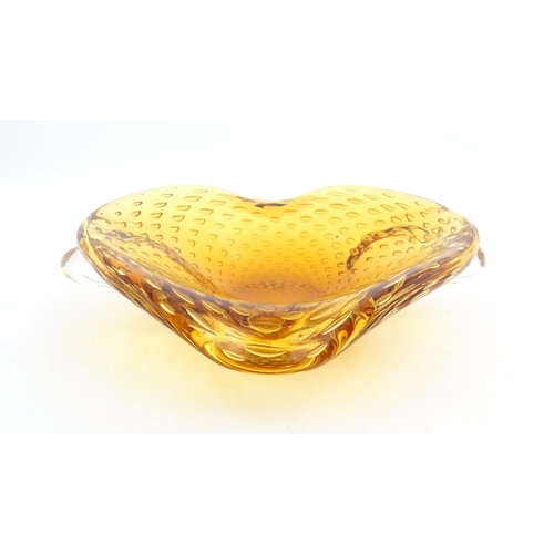 324 - Two Whitefriars controlled bubble ashtrays. Together with a Murano style amber glass bowl with contr... 