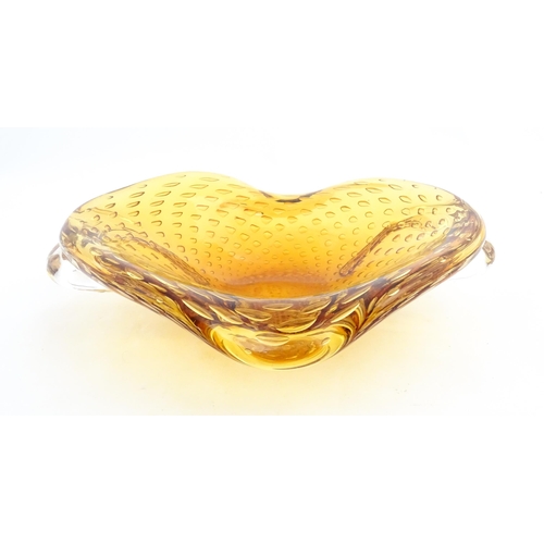 324 - Two Whitefriars controlled bubble ashtrays. Together with a Murano style amber glass bowl with contr... 