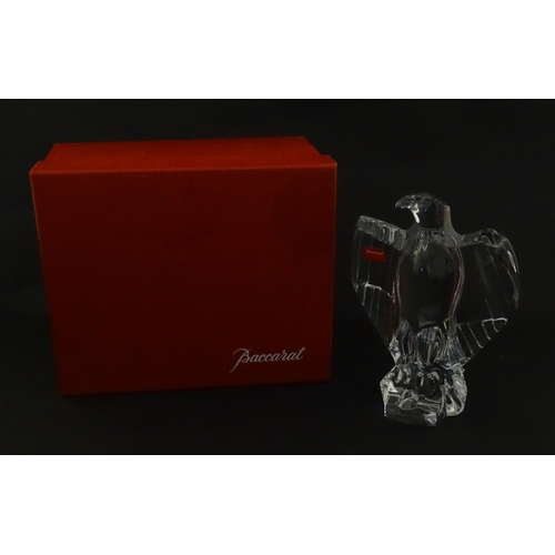 328 - A boxed Baccarat glass / crystal model of an eagle. Signed under. Approx. 7