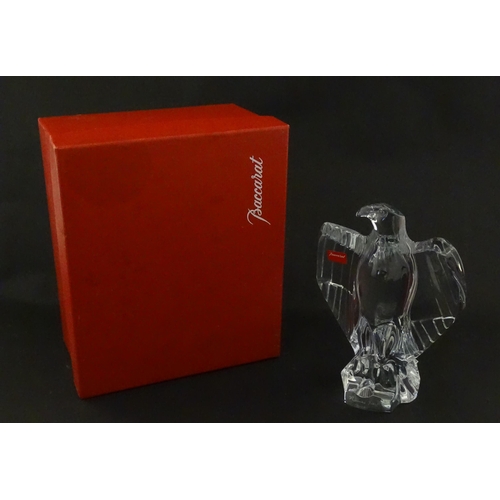 328 - A boxed Baccarat glass / crystal model of an eagle. Signed under. Approx. 7