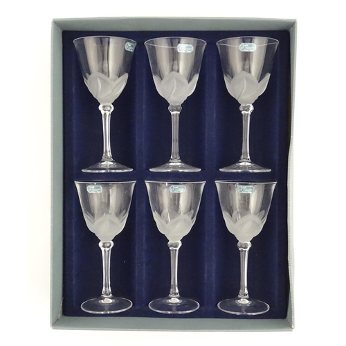 336 - A boxed set of six J. G. Durand crystal wine glasses, each with iced floral decoration and signed to... 