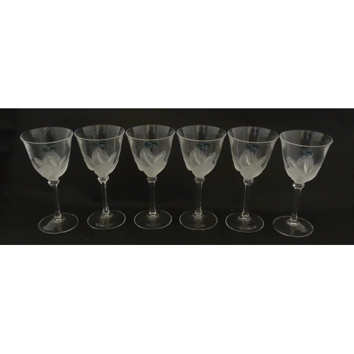 336 - A boxed set of six J. G. Durand crystal wine glasses, each with iced floral decoration and signed to... 