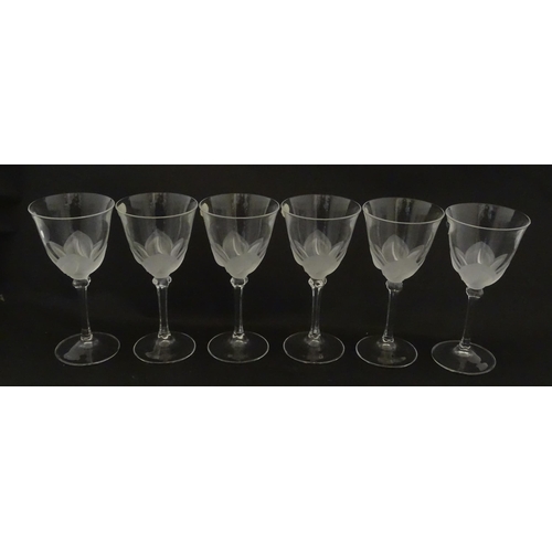 336 - A boxed set of six J. G. Durand crystal wine glasses, each with iced floral decoration and signed to... 