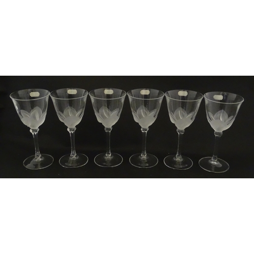 336 - A boxed set of six J. G. Durand crystal wine glasses, each with iced floral decoration and signed to... 