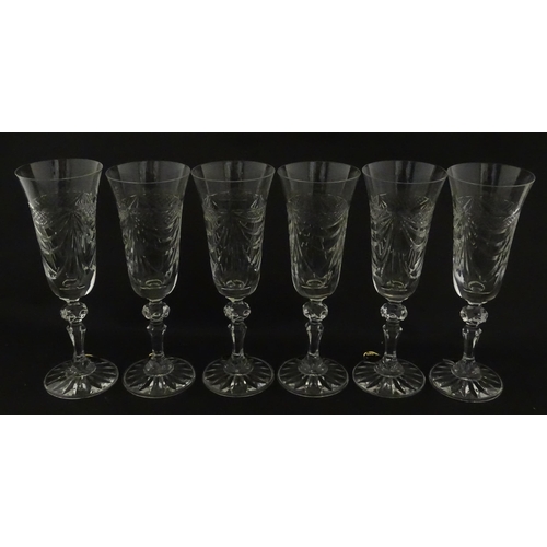 337 - A boxed set of six Veritable Cristal champagne flutes, each with hobnail and swag decoration, signed... 