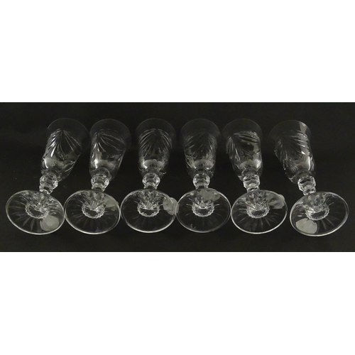 337 - A boxed set of six Veritable Cristal champagne flutes, each with hobnail and swag decoration, signed... 