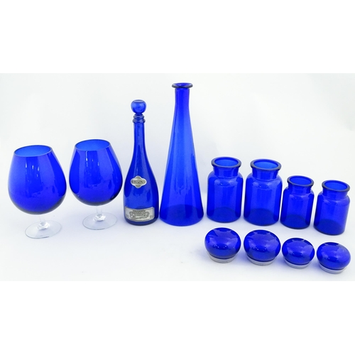 341 - A quantity of Bristol blue style glassware to include flasks, jars, oversized glasses, etc. Largest ... 