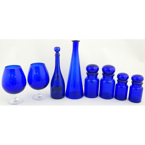 341 - A quantity of Bristol blue style glassware to include flasks, jars, oversized glasses, etc. Largest ... 