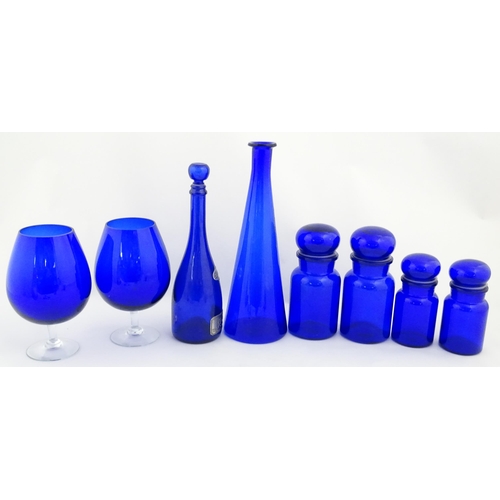 341 - A quantity of Bristol blue style glassware to include flasks, jars, oversized glasses, etc. Largest ... 