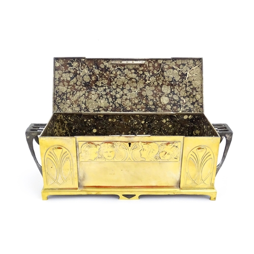 1200 - A WMF Art Nouveau brass casket / box with twin handles and hinged lid, decorated with four embossed ... 