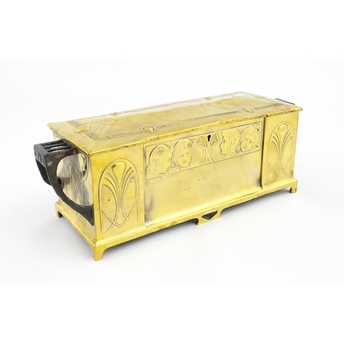 1200 - A WMF Art Nouveau brass casket / box with twin handles and hinged lid, decorated with four embossed ... 