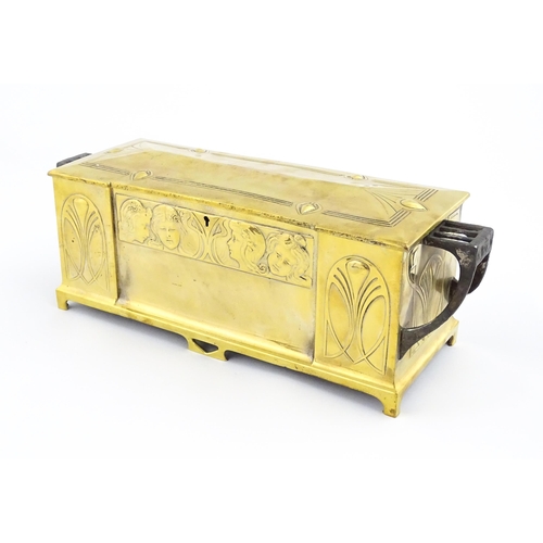 1200 - A WMF Art Nouveau brass casket / box with twin handles and hinged lid, decorated with four embossed ... 