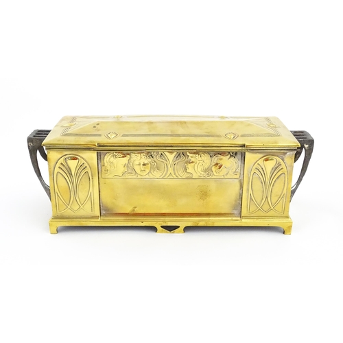 1200 - A WMF Art Nouveau brass casket / box with twin handles and hinged lid, decorated with four embossed ... 