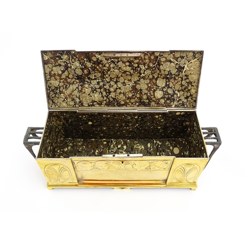 1200 - A WMF Art Nouveau brass casket / box with twin handles and hinged lid, decorated with four embossed ... 