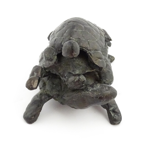 1215 - A 20thC cast sculpture, Travelling Turtles, modelled as three turtles. Approx. 3