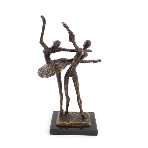 1221 - A 20thC cast modernist sculpture modelled as a couple dancing. Together with a cast bronze model of ... 