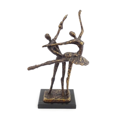 1221 - A 20thC cast modernist sculpture modelled as a couple dancing. Together with a cast bronze model of ... 