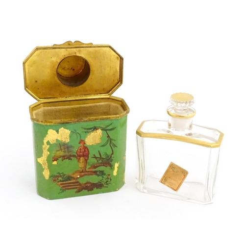 1224 - An early 20thC French glass perfume flask / scent bottle with gilt highlights, with gilt metal trave... 